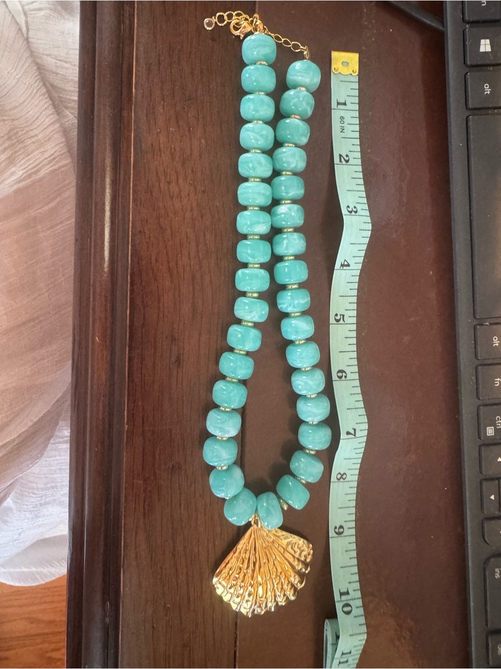 Turquoise Bead Necklace with Gold Shell Pendant